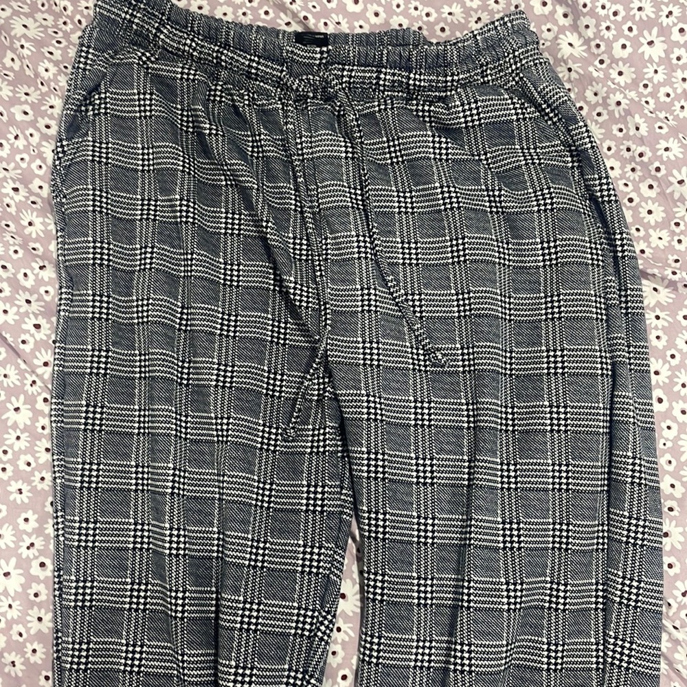 Houndstooth sweatpants.